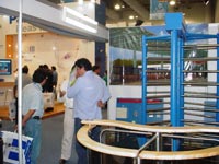 Full height turnstiles and rotor turnstile in the exhibition «Expo Seguridad Mexico-2006». Mexico City, Mexico.
