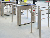 S-700 system with TTD-03.1 box tripod turnstile and WMD-05 motorized swing gate