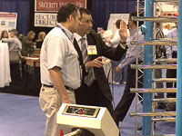 Compact tripod turnstile and full height turnstile PERCo at the exhibition ISC West-2005. Las Vegas, USA.