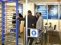 Full height turnstile and wicket gate PERCo at IFSEC exhibition. Birmingham, UK.