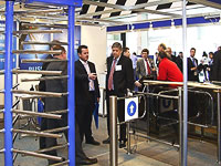Full height turnstile, wicket gate and rotary turnstile PERCo the exhibition IFSEC. Birmingham, England.